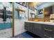 Stylish bathroom with geometric tile and modern vanity at 1021 Fantasy Dr, Davenport, FL 33896