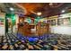 Home bar with movie posters and Hollywood-themed decor at 1021 Fantasy Dr, Davenport, FL 33896