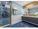 Modern bathroom with geometric tile and dual sinks at 1021 Fantasy Dr, Davenport, FL 33896