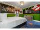 Ghostbusters themed bedroom with green walls at 1021 Fantasy Dr, Davenport, FL 33896