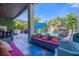Relaxing patio area with outdoor seating and pool access at 1021 Fantasy Dr, Davenport, FL 33896