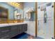 Modern bathroom with double vanity and walk-in shower at 1021 Fantasy Dr, Davenport, FL 33896