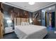 Spacious bedroom with Gotham City mural and ensuite bath at 1021 Fantasy Dr, Davenport, FL 33896