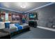 Spacious bedroom with a unique mural and comfortable bedding at 1021 Fantasy Dr, Davenport, FL 33896