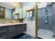 Stylish bathroom with a walk-in shower and double vanity at 1021 Fantasy Dr, Davenport, FL 33896
