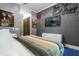 Spacious bedroom with a large TV and Godfather theme at 1021 Fantasy Dr, Davenport, FL 33896