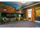 Jungle-themed bedroom with a bunk bed and murals at 1021 Fantasy Dr, Davenport, FL 33896