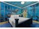 Under the sea themed bedroom with shark mural at 1021 Fantasy Dr, Davenport, FL 33896