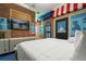 Themed bedroom with a whimsical bookstore mural at 1021 Fantasy Dr, Davenport, FL 33896