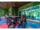 Outdoor patio with seating area and pool view at 1021 Fantasy Dr, Davenport, FL 33896