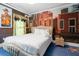 Charming bedroom with a Western-themed mural and a comfortable bed at 1021 Fantasy Dr, Davenport, FL 33896