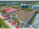 Aerial view of the property, showing multiple buildings at 1021 Fantasy Dr, Davenport, FL 33896