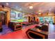 Home theater with large screen and comfortable seating at 1021 Fantasy Dr, Davenport, FL 33896