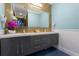 Modern bathroom with double vanity and gold accents at 1021 Fantasy Dr, Davenport, FL 33896