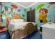Dreamy bedroom with a mural of umbrellas and a gold bed at 1021 Fantasy Dr, Davenport, FL 33896