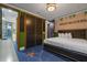 Ghostbusters themed bedroom with green walls at 1021 Fantasy Dr, Davenport, FL 33896