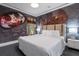 Cool bedroom with Batman-themed mural and city skyline at 1021 Fantasy Dr, Davenport, FL 33896