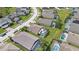Aerial view of a community with numerous houses and pools at 503 Balmoral Dr, Davenport, FL 33896