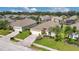 Aerial view of a charming house in a well-maintained community at 503 Balmoral Dr, Davenport, FL 33896