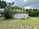 Spacious backyard with grassy area and seating at 1501 Fort Smith Blvd, Deltona, FL 32725