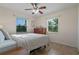 Spacious bedroom with a double bed, dresser, and ceiling fan at 3204 Casteen Rd, Leesburg, FL 34748