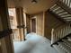 Clean and well-lit interior hallway with stairs at 470 S Pin Oak Pl # 204, Longwood, FL 32779