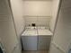 Convenient laundry closet with washer and dryer at 470 S Pin Oak Pl # 204, Longwood, FL 32779