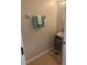 Small half bathroom with pedestal sink and tile floor at 1241 Retreat View Cir, Sanford, FL 32771