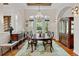 Formal dining room with hardwood floors, a large table, and a beautiful chandelier at 3499 Rockcliff Pl, Longwood, FL 32779