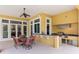 Outdoor kitchen with granite countertop and stainless steel appliances at 3499 Rockcliff Pl, Longwood, FL 32779