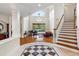 Bright and airy living room with hardwood floors, piano, and views to pool at 3499 Rockcliff Pl, Longwood, FL 32779