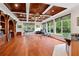Bright home gym with wood-paneled ceiling, hardwood floors, and exercise equipment at 3499 Rockcliff Pl, Longwood, FL 32779