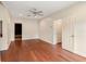Spacious bedroom with hardwood floors and access to other rooms at 3499 Rockcliff Pl, Longwood, FL 32779