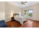 Charming bedroom with hardwood floors, a ceiling fan and ample natural light at 3499 Rockcliff Pl, Longwood, FL 32779