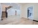Elegant entryway with hardwood floors and a view into the living room and kitchen at 734 S Mills Ave, Orlando, FL 32801
