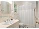 Clean bathroom with shower/tub combo and updated vanity at 1391 Richmond Rd, Winter Park, FL 32789