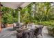 Relaxing patio with outdoor furniture and lush landscaping at 1391 Richmond Rd, Winter Park, FL 32789