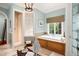 Bathroom with a soaking tub and walk-in shower at 1391 Richmond Rd, Winter Park, FL 32789