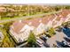 Aerial view of townhouses and surrounding neighborhood at 2602 Sunrise Shores Dr, Kissimmee, FL 34747