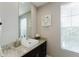 Bathroom with single vanity and granite countertop at 2602 Sunrise Shores Dr, Kissimmee, FL 34747