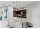 Modern kitchen with granite countertops and stainless steel appliances at 2602 Sunrise Shores Dr, Kissimmee, FL 34747