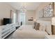 Main bedroom with king-size bed and modern decor at 2602 Sunrise Shores Dr, Kissimmee, FL 34747
