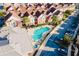 Community pool with surrounding lounge chairs at 2602 Sunrise Shores Dr, Kissimmee, FL 34747