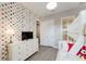bedroom with bunk beds, TV, and Mickey Mouse theme at 2602 Sunrise Shores Dr, Kissimmee, FL 34747