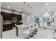Modern kitchen with stainless steel appliances and granite countertops at 2602 Sunrise Shores Dr, Kissimmee, FL 34747