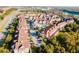 Aerial perspective of townhome community with pool at 2602 Sunrise Shores Dr, Kissimmee, FL 34747
