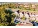 Aerial view showcasing townhouses, parking, and neighborhood at 2602 Sunrise Shores Dr, Kissimmee, FL 34747