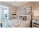 Main bedroom with king-size bed and modern decor at 2602 Sunrise Shores Dr, Kissimmee, FL 34747