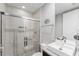 Clean bathroom with a walk-in shower and modern vanity at 2602 Sunrise Shores Dr, Kissimmee, FL 34747