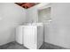 Basement laundry room with washer and dryer at 104 E Mcclendon St, Lady Lake, FL 32159